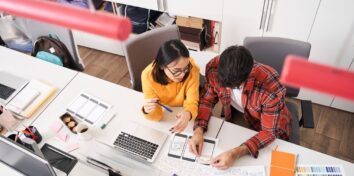 Two professionals collaborating on a project.