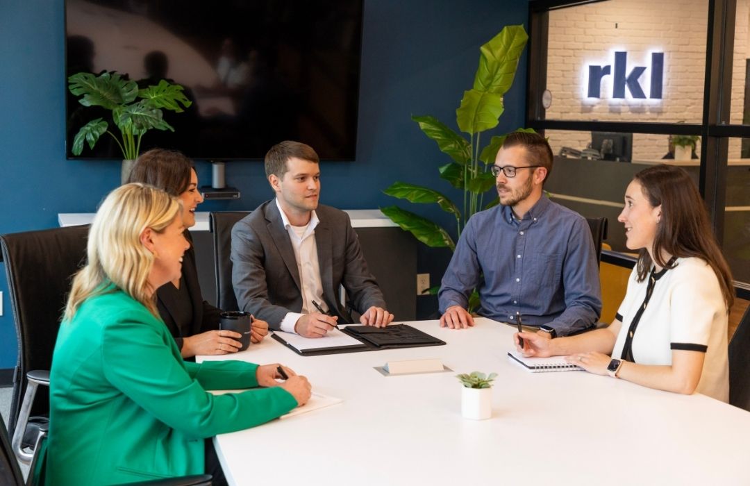 RKL team members in meeting