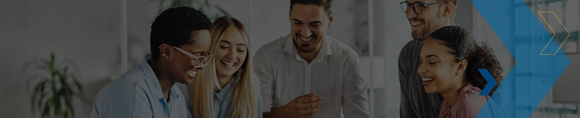 group of co-workers meeting around a table with RKL branding