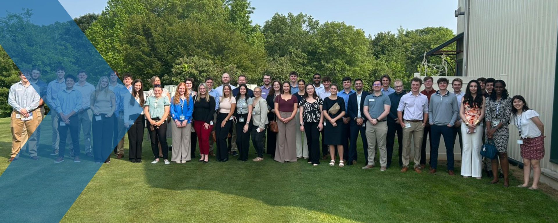 group of interns posing for photo with RKL branding