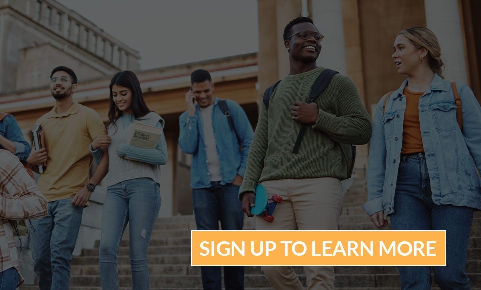 Group of college students walking down steps with RKL branding