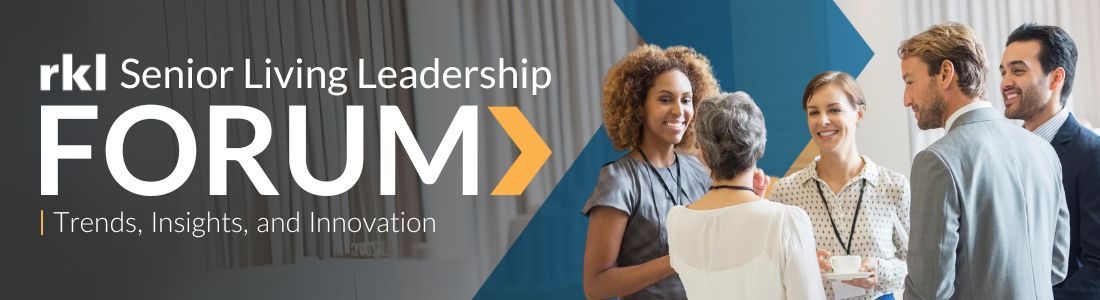 five people gathered at a business event