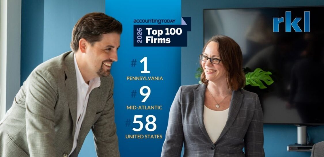 Accounting Today Top 100 Firms Logo and photo of man and woman smiling in an office