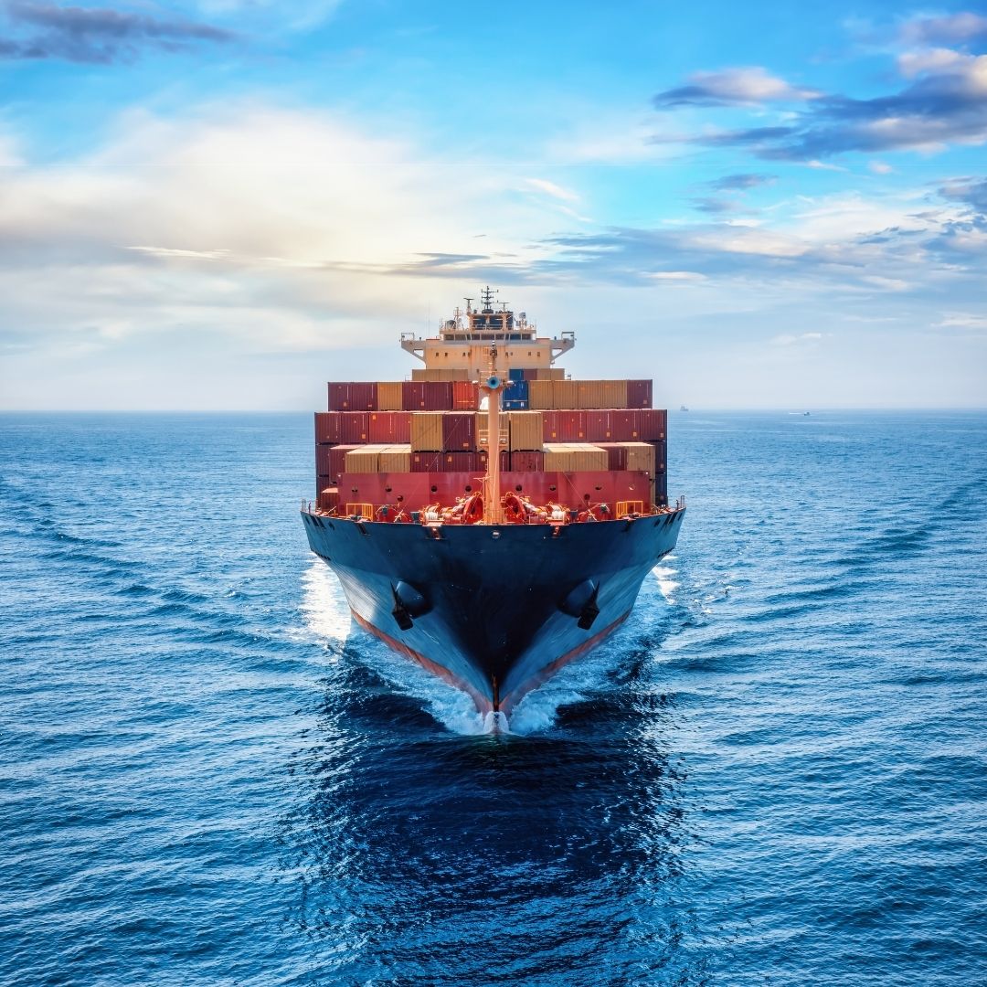 Container ship carrying cargo across the ocean.