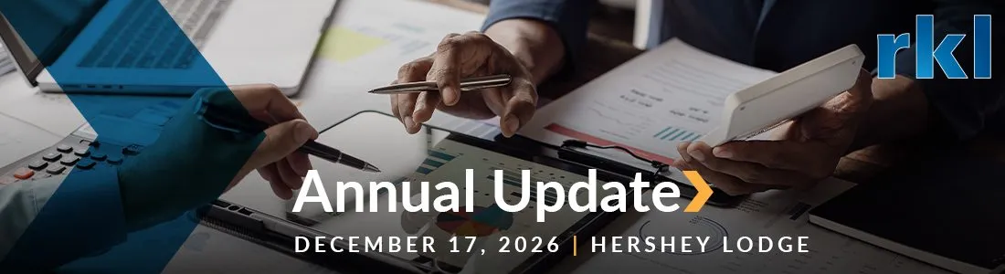 Business people hands working over paperwork, RKL Annual Update header